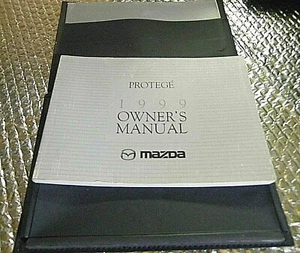 Factory Owners Manual 1999 Mazda Protege & Glovebox Case Folder & Other Paper - Picture 1 of 1