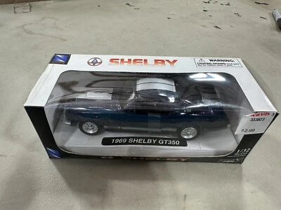 New Ray City Cruiser Collection 1:32 Scale 2000 Shelby Series 1 Diecast Car D32 - Image 1 of 2
