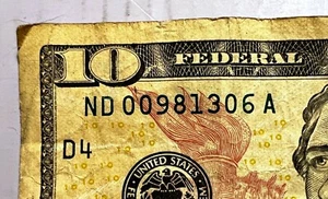 Banconota 10 dollari 2017 circolata fantasia doppio ZERO numero di serie ND 00 981306 A - Foto 1 di 3