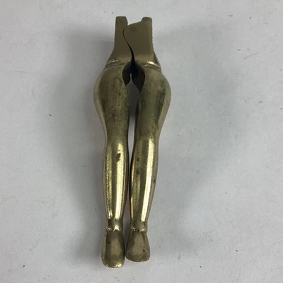 Cascanueces vintage de latón macizo para mujer dama torso piernas desnudas Foto 1 de 4
