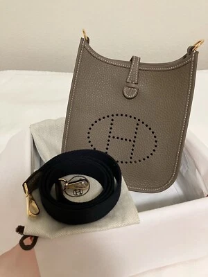 NEW HERMÈS Etoupe GHW Mini Evelyne TPM Bleu Indigo strap, Stamp W w/ Receipt - Image 1 of 4