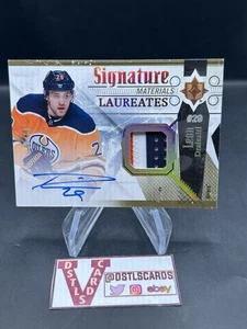 2017-18 Ultimate - LEON DRAISAITL SIGNATURE MATERIALS PATCH AUTO /99 #SML-LD - Picture 1 of 2