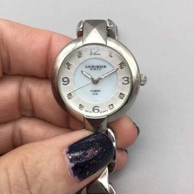 Reloj Akribos XXIV para mujer 31 mm esfera diamante tono plata suizo batería nueva 6,75" Foto 1 de 4