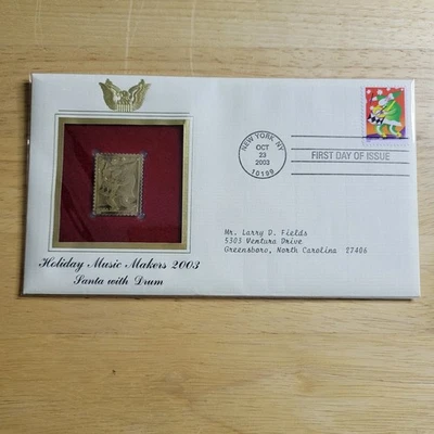 Réplica de sello Holiday Music Maker 2003 Santa Drum oro 22kt emisión primer día con tarjeta Foto 1 de 4