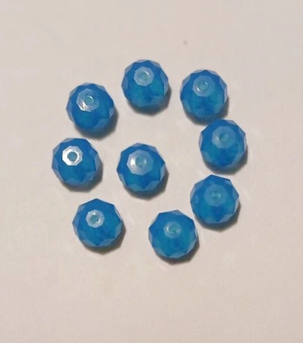 7 Swarovski Crystal Rondelle #5040 8mm, Caribbean Blue Opal - Image 1 of 1