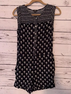 Mameluco sin mangas Ann Taylor LOFT talla S negro blanco estampado de flores cintura elástica Bu Foto 1 de 4