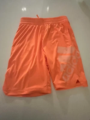 Pantalón corto adidas niño naranja. Talla 10-12. En EXCELENTE ESTADO.  Foto 1 de 2