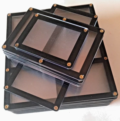 1 LOTE DE (16) PLACAS DE TORNILLO PARA TARJETAS COLECCIONABLES CON MARCO NEGRO SURTIDAS Foto 1 de 4