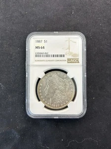 1887 MORGAN DOLLAR NGC MS 64 UNCIRCULATED - SLAB - $1 Vivid Toning on Revers - Picture 1 of 2
