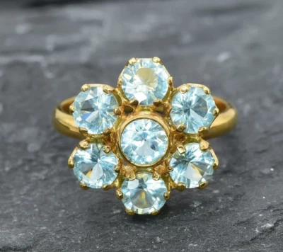Anillo con diseño de flores de topacio azul natural tamaño de anillo de oro de 10 k disponible Foto 1 de 4