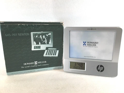 HOWARD MILLER Co. 645-707 Newton PHOTO FRAME / DESK CLOCK / CALCULATER Cover