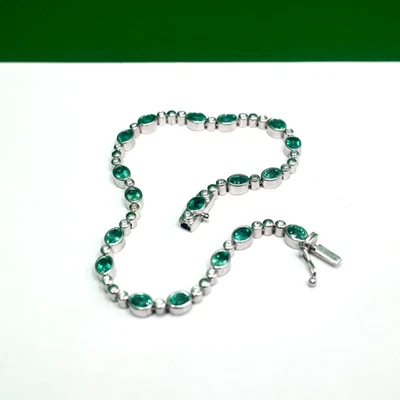 Brazalete de tenis de diamantes y esmeraldas de oro de 18 quilates (3+ quilates) Foto 1 de 4