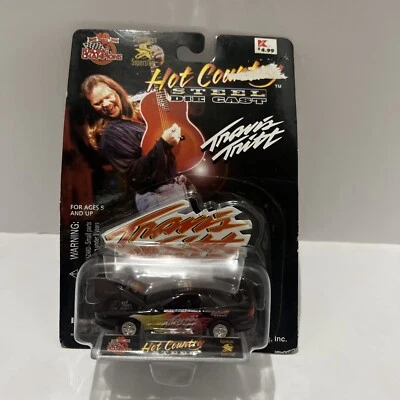 ГОНОЧНЫЕ ЧЕМПИОНЫ HOT COUNTRY СТАЛИ ЛИТОЙ TRAVIS TRITT 1999 ВЫПУСК #25 запечатанный - Изображение 1 из 2