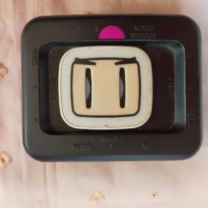 Interruptor selector de video AV Hudson Soft Oficial Bomberman negro difícil de encontrar usado - Imagen 1 de 2