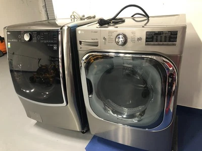 Slightly Used Mega Capacity Black Stainless Steel LG Washer and Dryer Combo - Image 1 of 4