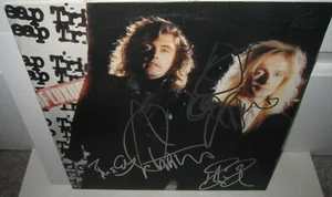 CHEAP TRICK SIGNED LAP OF LUXRY ALBUM RICK NIELSEN ROBIN ZANDER AUTOGRAPH X4 - Picture 1 of 6