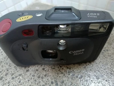 CANON Prima Shot Fotocamera Analogica Compatta Vintage Telecomando Pozzetto 35mm - Immagine 1 di 4