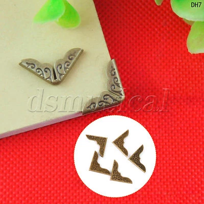 20 piezas esquinas de libros bronceados estilo retro para álbumes de fotos 1,18" x 1,18" Foto 1 de 4