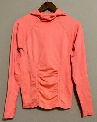 Sudadera con Capucha Athleta M Tracker Sin Costuras Top Coral Naranja Ropa Activa Correr Entrenamiento Foto 1 de 4