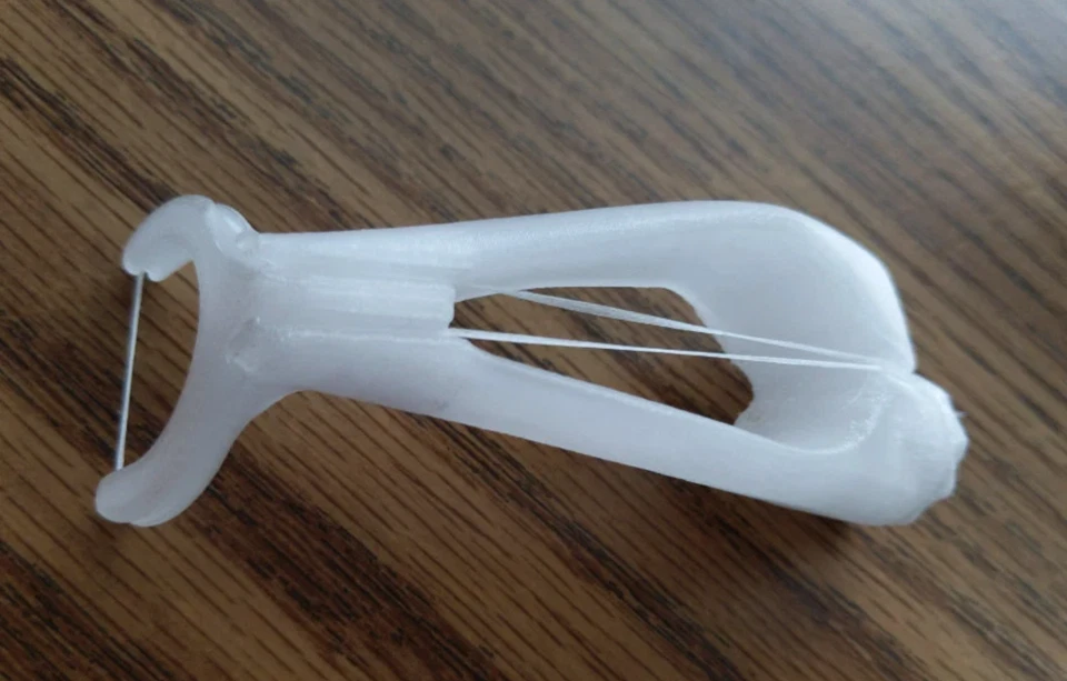 Hilo dental reutilizable | Soporte de hilo dental de cuerda fácil | Recargable con CUALQUIER hilo dental Foto 1 de 4