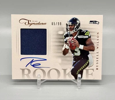 Russell Wilson 2012 Prime Signatures RC Auto - Game Used Patch/Relic  65/99 - Image 1 of 2