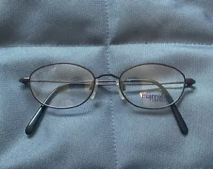 RARO NUEVO MARCO DE GAFAS MARCOLIN 2033 BORDE COMPLETO OJO DE GATO TITANIO RETRO PÚRPURA - Imagen 1 de 8