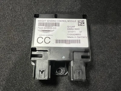 MÓDULO DE RETENCIÓN DE PESO PARA PASAJEROS ASTON MARTIN # 7G43-625B00-CC Foto 1 de 4