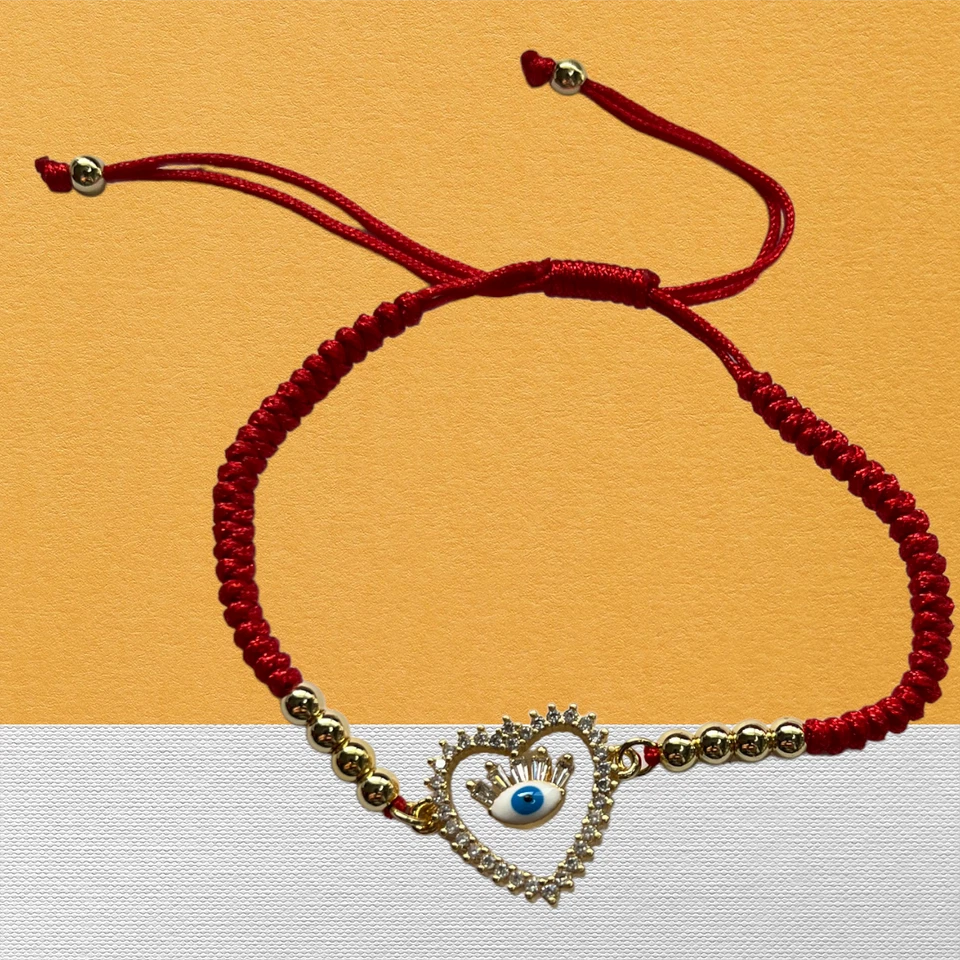 Pulcera de Hilo Rojo y Oro Laminado 14 son Diferentes Dijes para Protección Foto 1 de 1