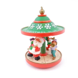 Vintage Punze Ornamente Weihnachtsmann mit Freunden Karussell (1983) - Bild 1 von 7