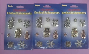 Embellecimientos metálicos encantadores Darice 3 paquetes con temas de invierno muñeco de nieve copos de nieve - Imagen 1 de 3