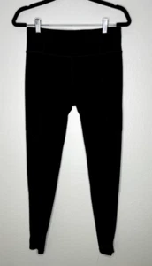 Leggings de entrenamiento de tiro alto Athleta talla M negros paneles laterales de malla transparentes - Imagen 1 de 6