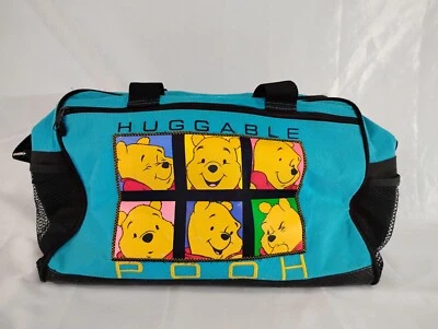 Bolso de viaje de lona azul Winnie the Pooh de colección Disney correa de transporte Pooh abrazable Foto 1 de 4