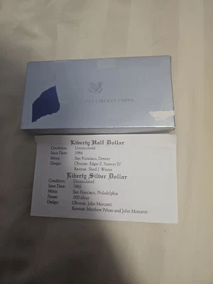 1986 US Liberty Coins Ellis Island 90% Silver Dollar Half Dollar Proof Set - Image 1 of 4