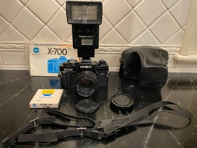 Minolta X-700 35mm SLR Film Camera  + 50MM Lens + PROMURA FD 900 TT Flash + UV F - Image 1 of 2