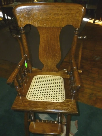 Antique High Chair Oak Folding cane seat refinished 1900's with tray cast iron Cover