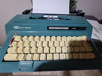 Máquina de escribir Smith-Corona vintage automática esterlina 12 verde azulado con bolsa de cuero Foto 1 de 4