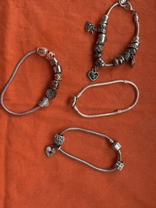 4 Silvertone Charm Bracelets Pre Owned - Picture 1 of 4