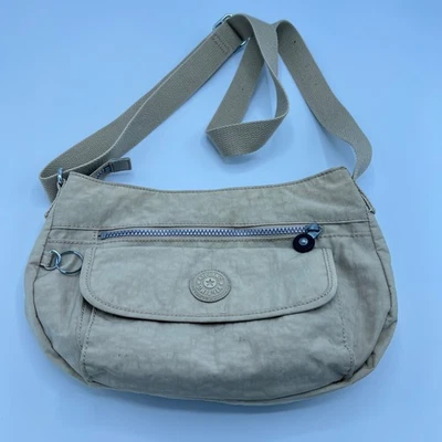 Bolso Bandolera Kipling Syro Nylon Beige Tostado Multi Bolsillo Foto 1 de 4