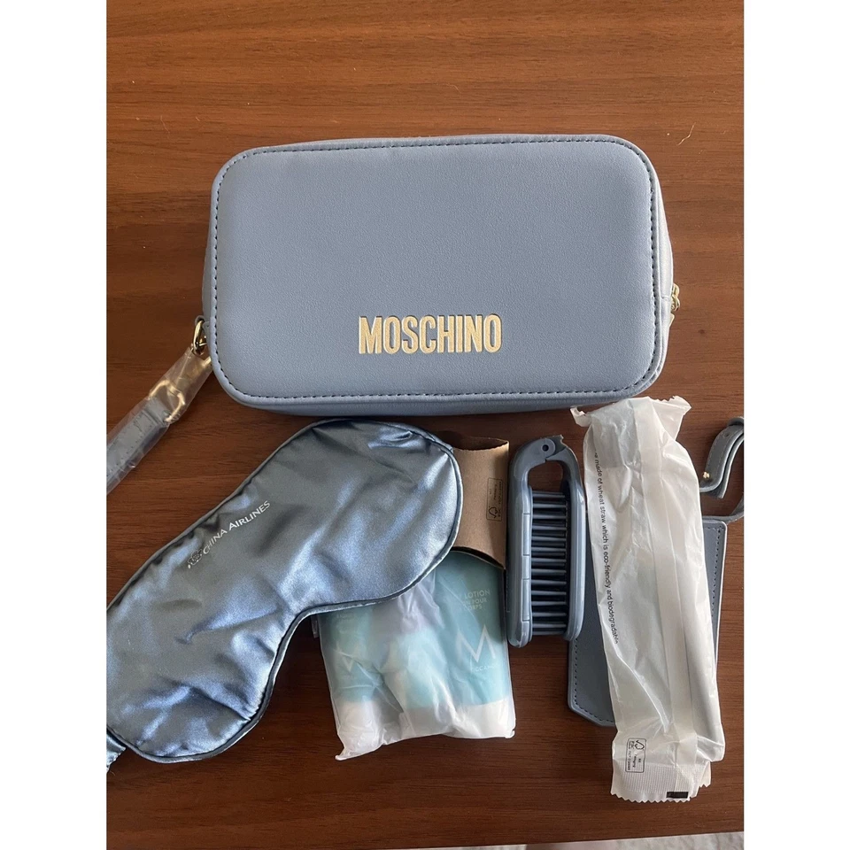 Moschino Etiqueta de Equipaje Artículos de Aseo Bolsa y Amenidades Azul Claro Foto 1 de 1