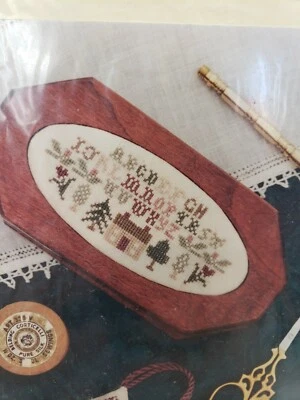 EL SAMPLER DE HILO DIBUJADO NEEDAIRE PATRÓN DE PUNTO DE CRUZ Foto 1 de 3