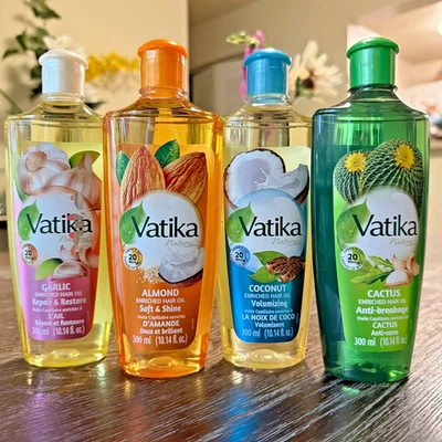 Aceite capilar enriquecido Dabur Vatika Naturals 300 ml - Aceite natural para el crecimiento del cabello | Unisex Foto 1 de 4