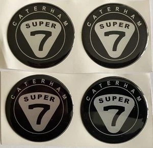 PEGATINAS TAPA CENTRAL RUEDA DE ALEACIÓN CATERHAM SUPER 7 ABOVEDADA X4 NEGRA PLATA 50mm - Imagen 1 de 5