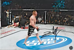 BROCK LESNAR AUTOGRAPHED 8 1/2 X 12 UFC WWE PHOTO "LOOK" - Picture 1 of 1