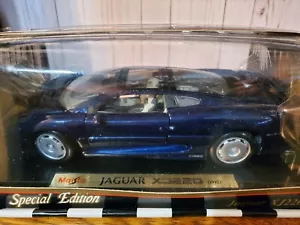 Maisto 1992 Jaguar XJ 220 escala 1:18 modelo diecast coche espejo roto azul 31807 - Imagen 1 de 5