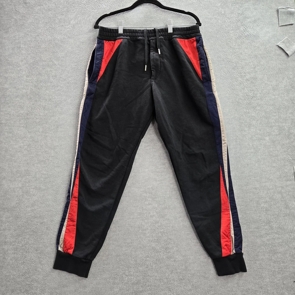Pantalones deportivos Alexander Mcqueen para hombre L negros rojos Italia Foto 1 de 4