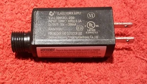 E12) Taizhou Power Adapter #YJ-L300U0-200. Output: DC 30V, 200mA, Raintight. - Picture 1 of 2
