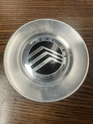 Tapacubos central Mercury Mountaineer 2006-2007 OEM 6L94-1A096-BC Foto 1 de 4