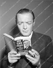 45np-1576 circa 1947 Peter Lorre intrigued w book How To Win Friends and Influen