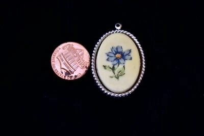 JUEGO OVALADO PLÁSTICO ESTAMPADO FLORAL EN COLGANTE PLATEADO • 27x35mm BONITO Foto 1 de 2