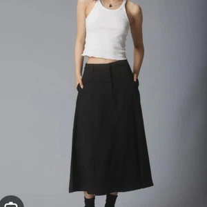 GONNA MIDI UNIF MIZUKI NERA TAGLIA XS - Foto 1 di 8